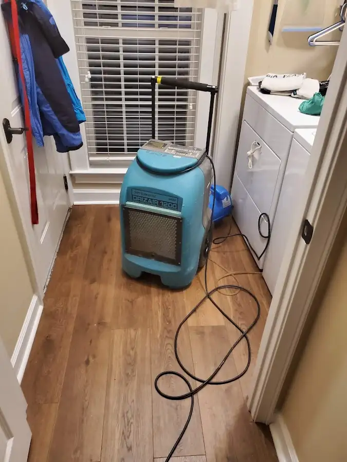 Commercial dehumidifier deployed for Flood Damage Cleanup in Newton